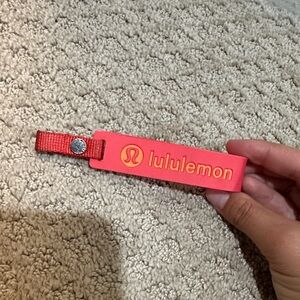 lululemon pink and coral keychain strap